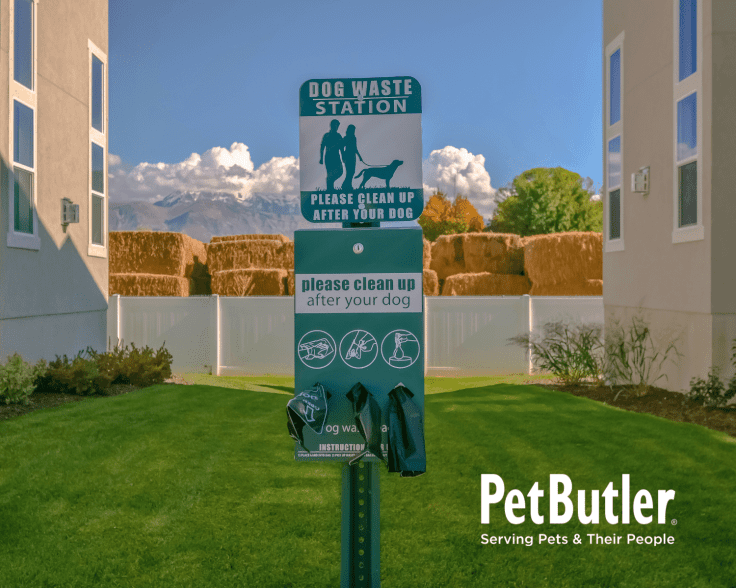 Pet Waste Station sign with please clean up after your dog note with bags