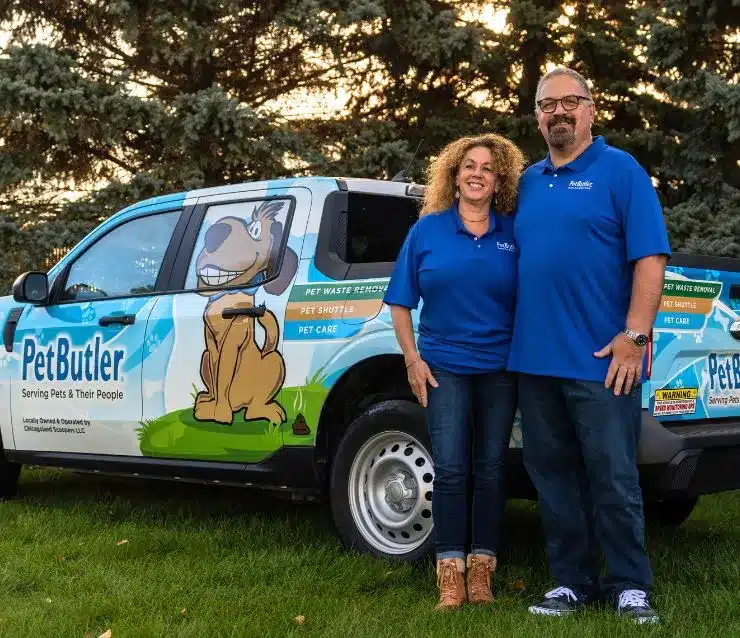 Michael Kidd, owner of Pet Butler of Cary, NC, standing next to a Pet Butler truck.