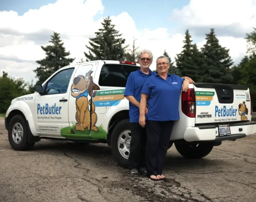 Tony Barker, owner of Pet Butler of Indianapolis, IN, standing next to a Pet Butler truck.