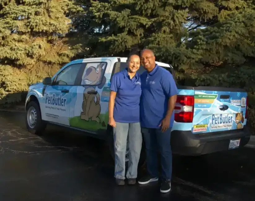 Pet Butler of Renton, WA Franchise owners in front of Pet Butler truck