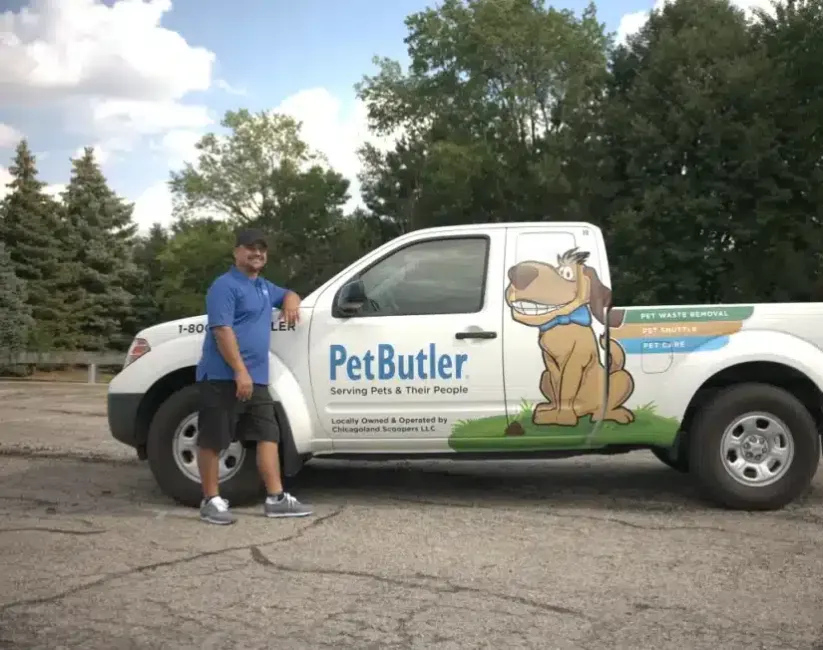 Jason Varas de Valdes, owner of Pet Butler of Walnut Creek, CA, standing next to a Pet Butler truck.