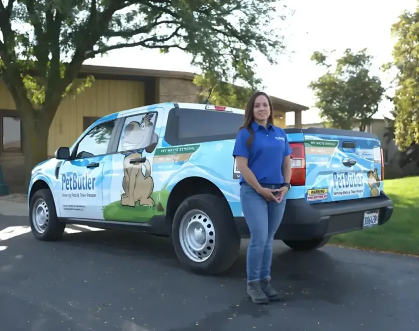 Pet Butler Franchise owner in front of Pet Butler truck