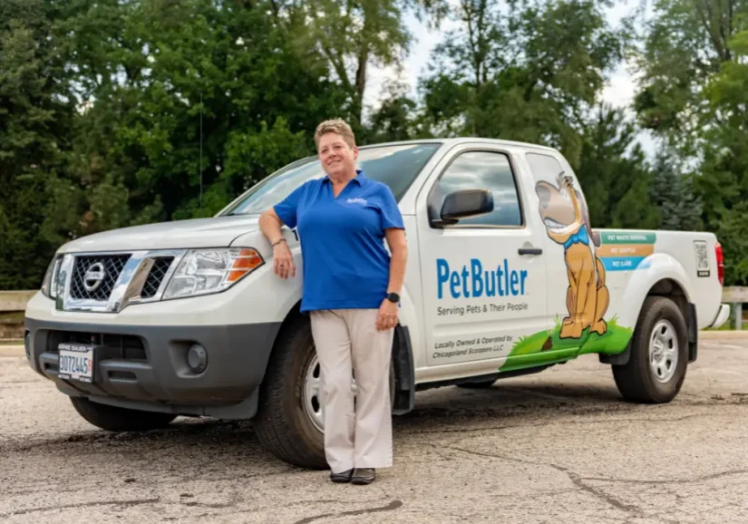 Pet Butler Chadds Ford owner Rosemarie Richardson standing next to her truck
