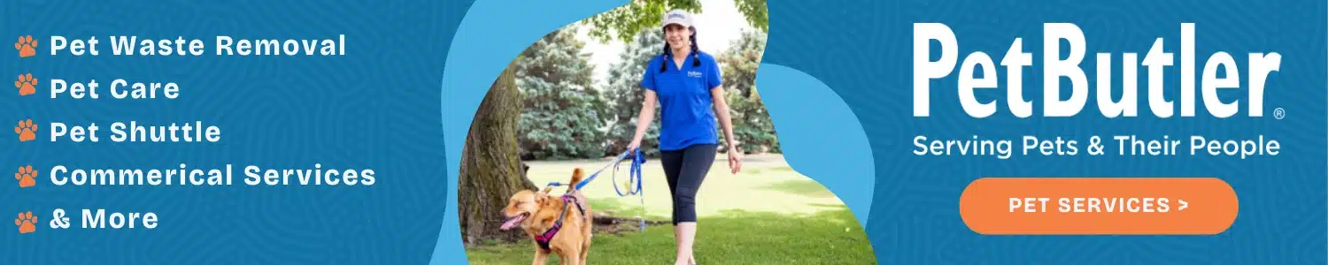 Pet Butler learn more about our services banner. We offer the following pet services: pet waste removal, pet care, pet shuttle, commercial services and more. Image is of a Pet Butler employees smiling and walking a golden retriever across the grass on a sunny summer day.